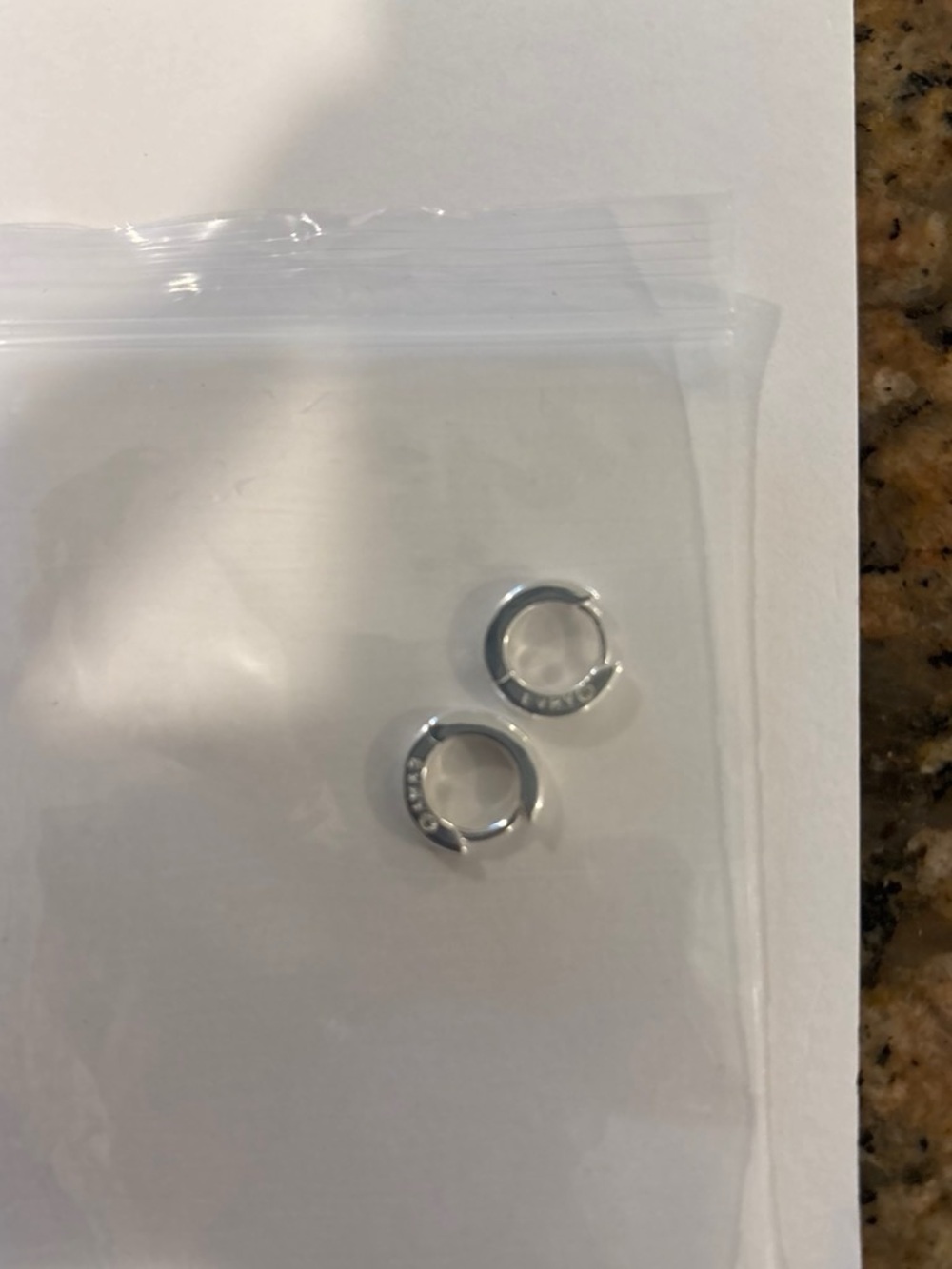 Sterling Silver Huggie Hoop Earrings with Clear Accent Stones - Silver
